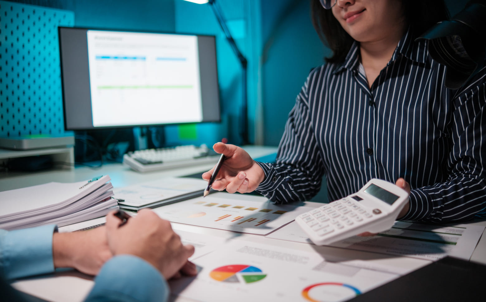 accountant-calculating-numbers-on-calculator-audi-2025-01-10-11-29-59-utc-8320443 accountant-calculating-numbers-on-calculator-audi-2025-01-10-11-29-59-utc-8320443