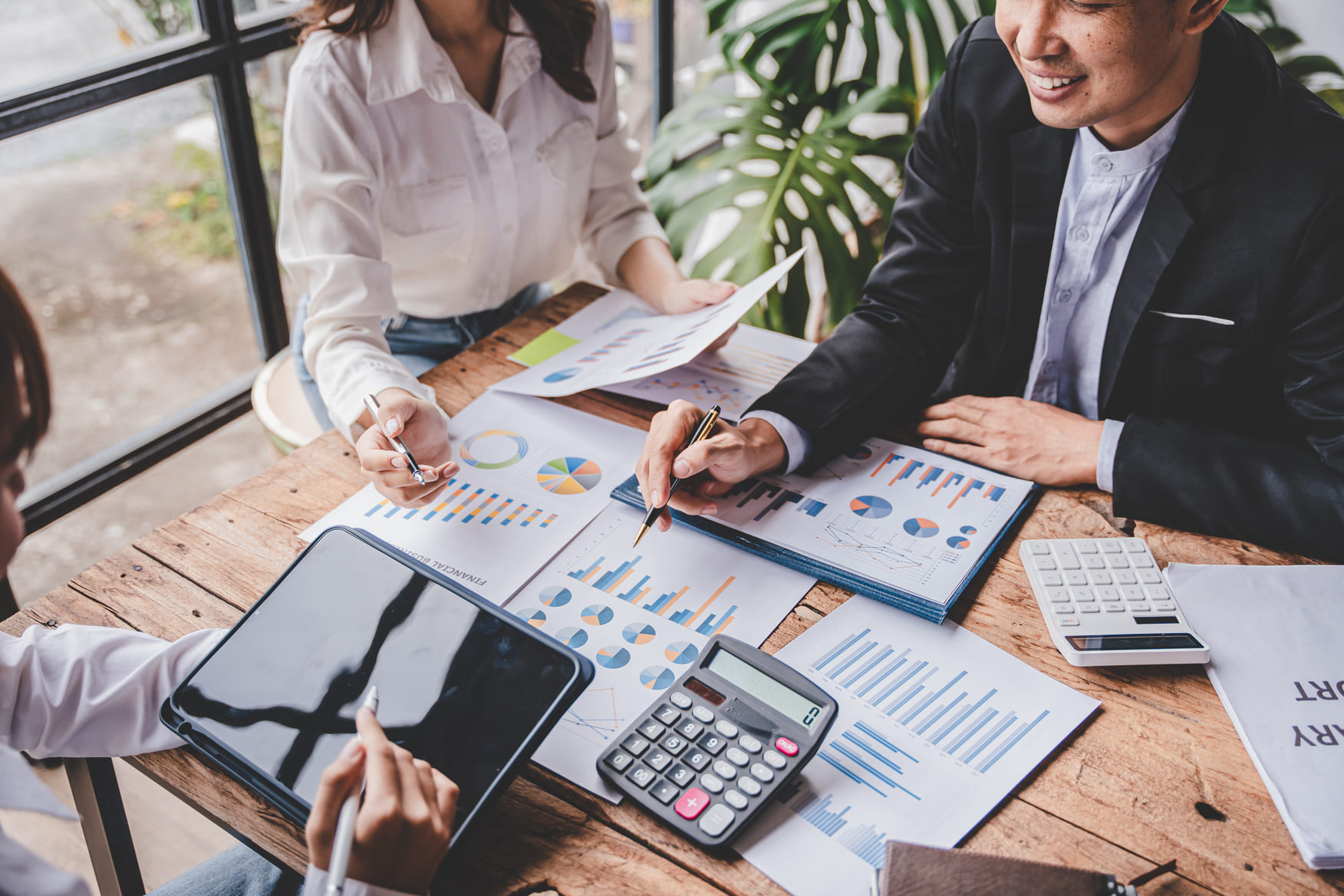 young-colleagues-discussing-business-and-price-cha-2025-03-08-15-55-27-utc-4357084